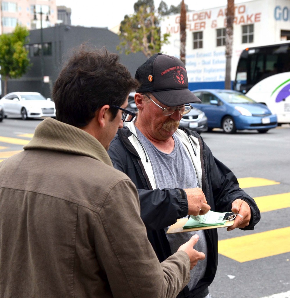 SFBC’s Marc Caswell, who found the video footage, talking about Safe SoMa Streets. In background, business that captured footage of the crash.